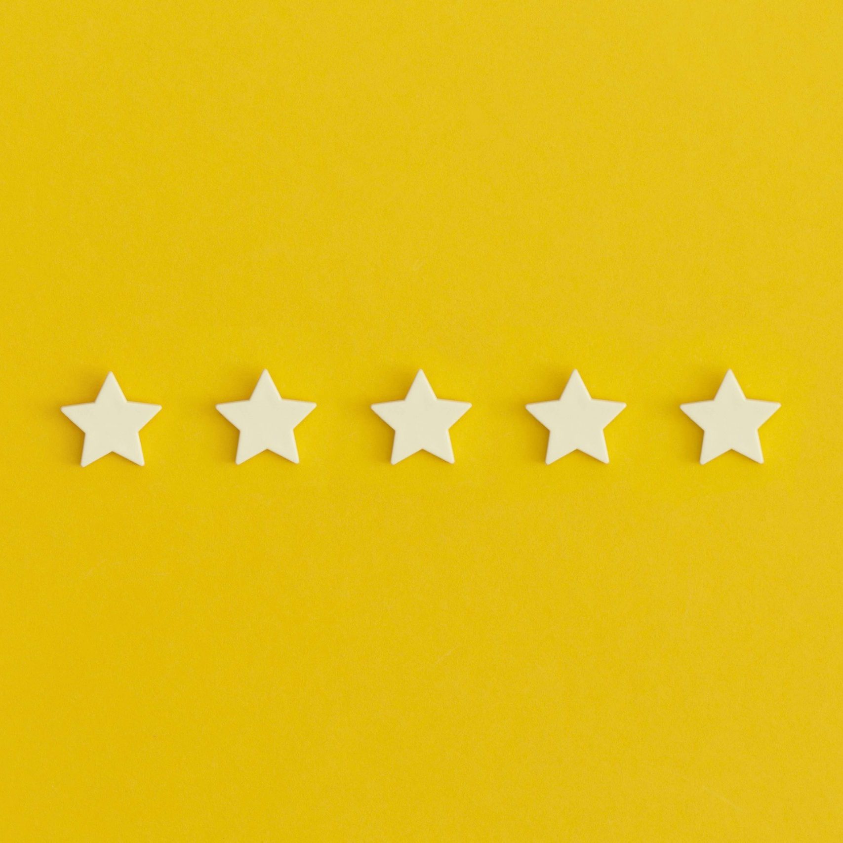 Five 5 stars, best excellent services rating on yellow background.